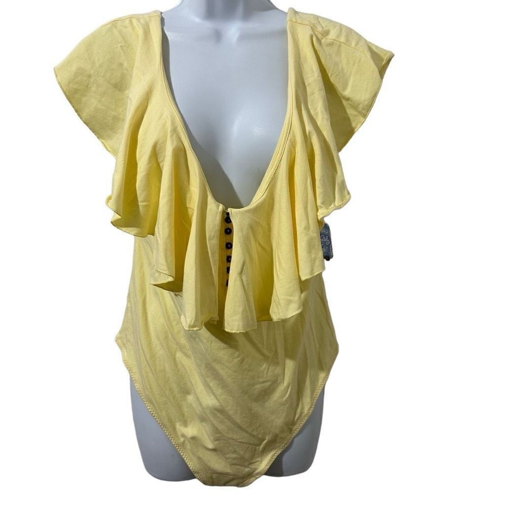 Free people,yellow bodysuit, size XL.  A489